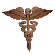 Wooden wall decoration with wings and a snake on a white background