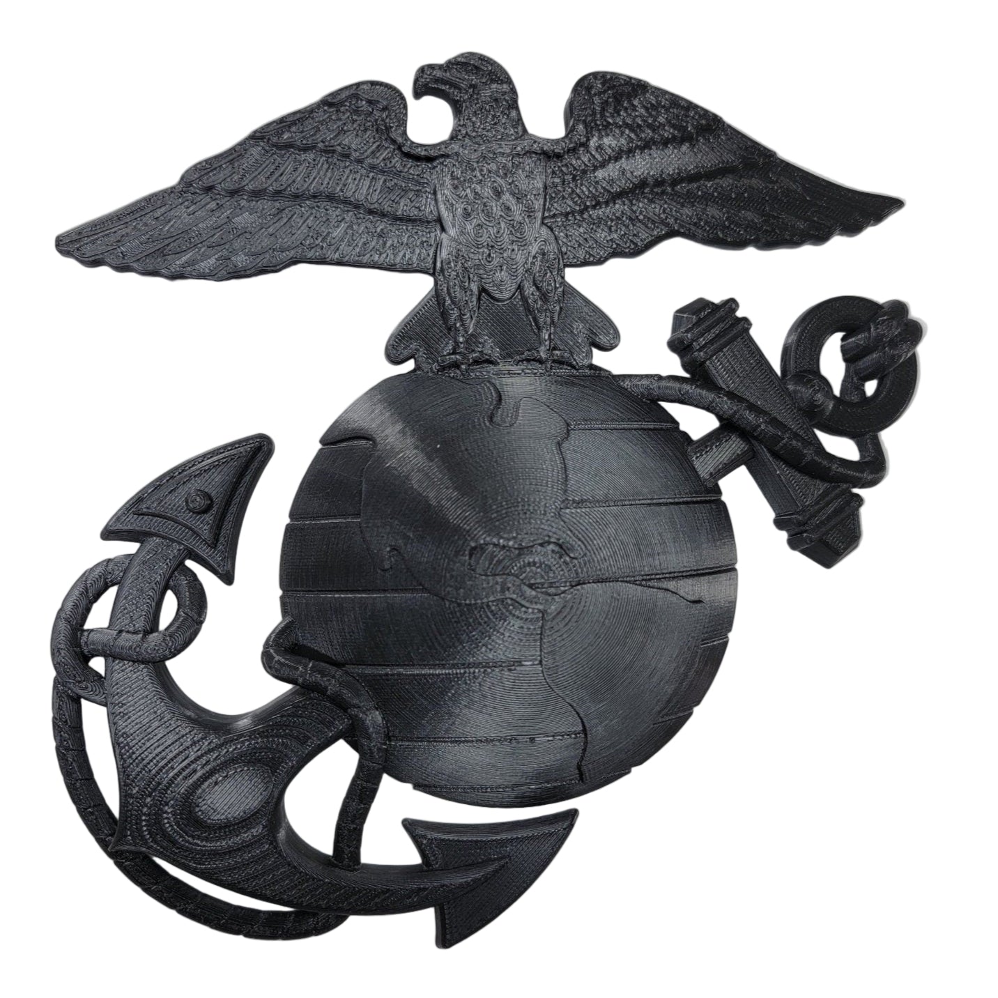 Black emblem with an eagle globe and anchor on a white background