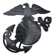 Black emblem with an eagle globe and anchor on a white background