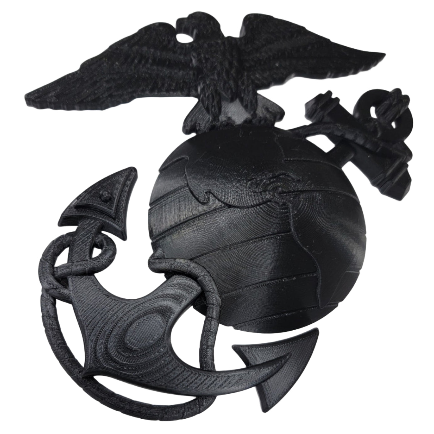 Black emblem with an eagle globe and anchor on a white background another viewing angle