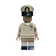 US Navy figure of a person in a uniform with a cap on a white background
