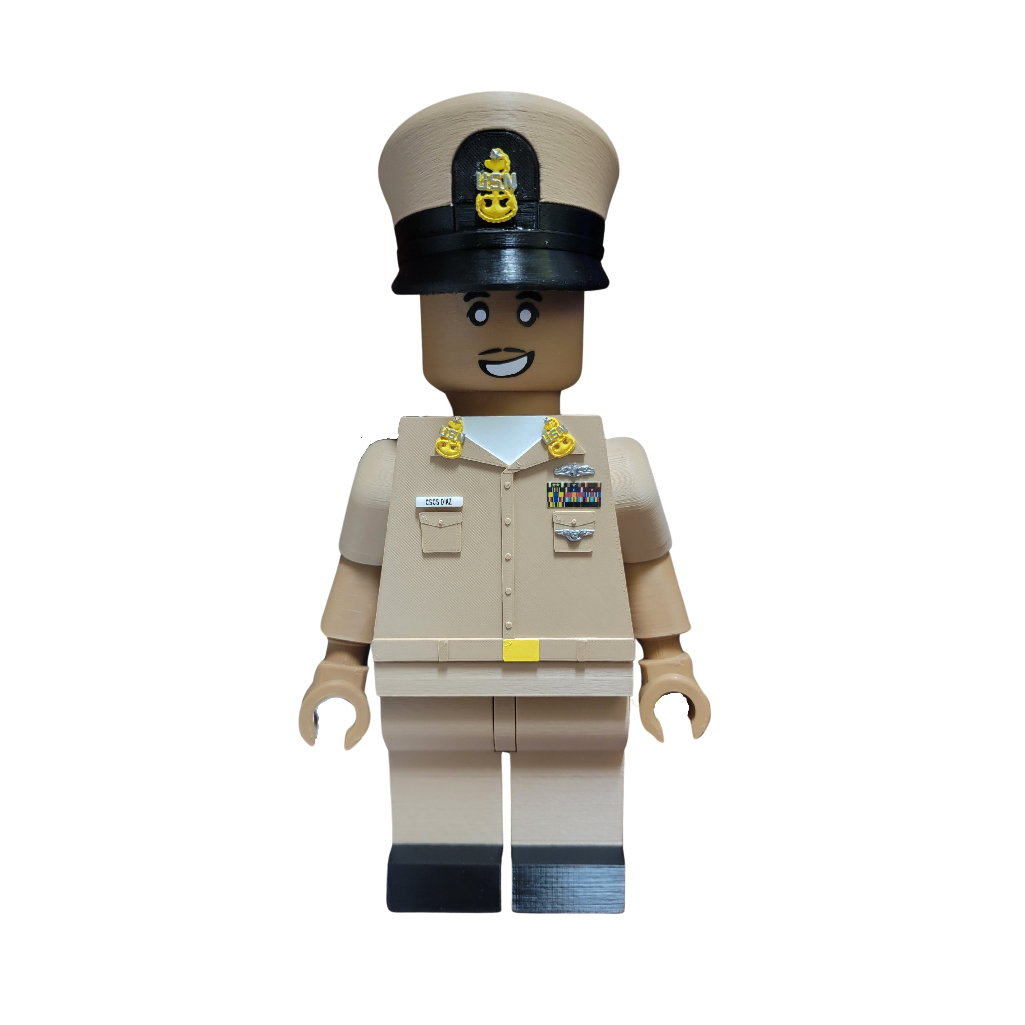 US Navy figure of a person in a uniform with a cap on a white background