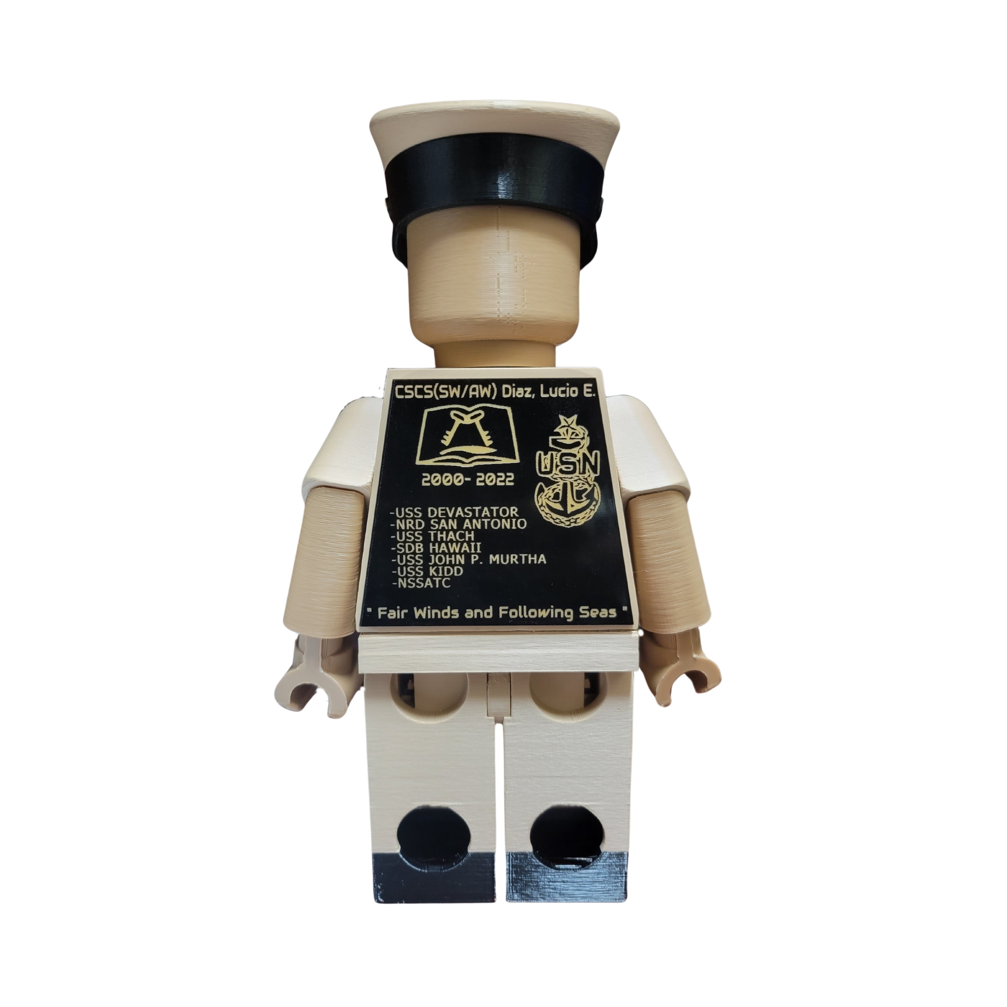 US Navy figurine with a detailed label on a white background
